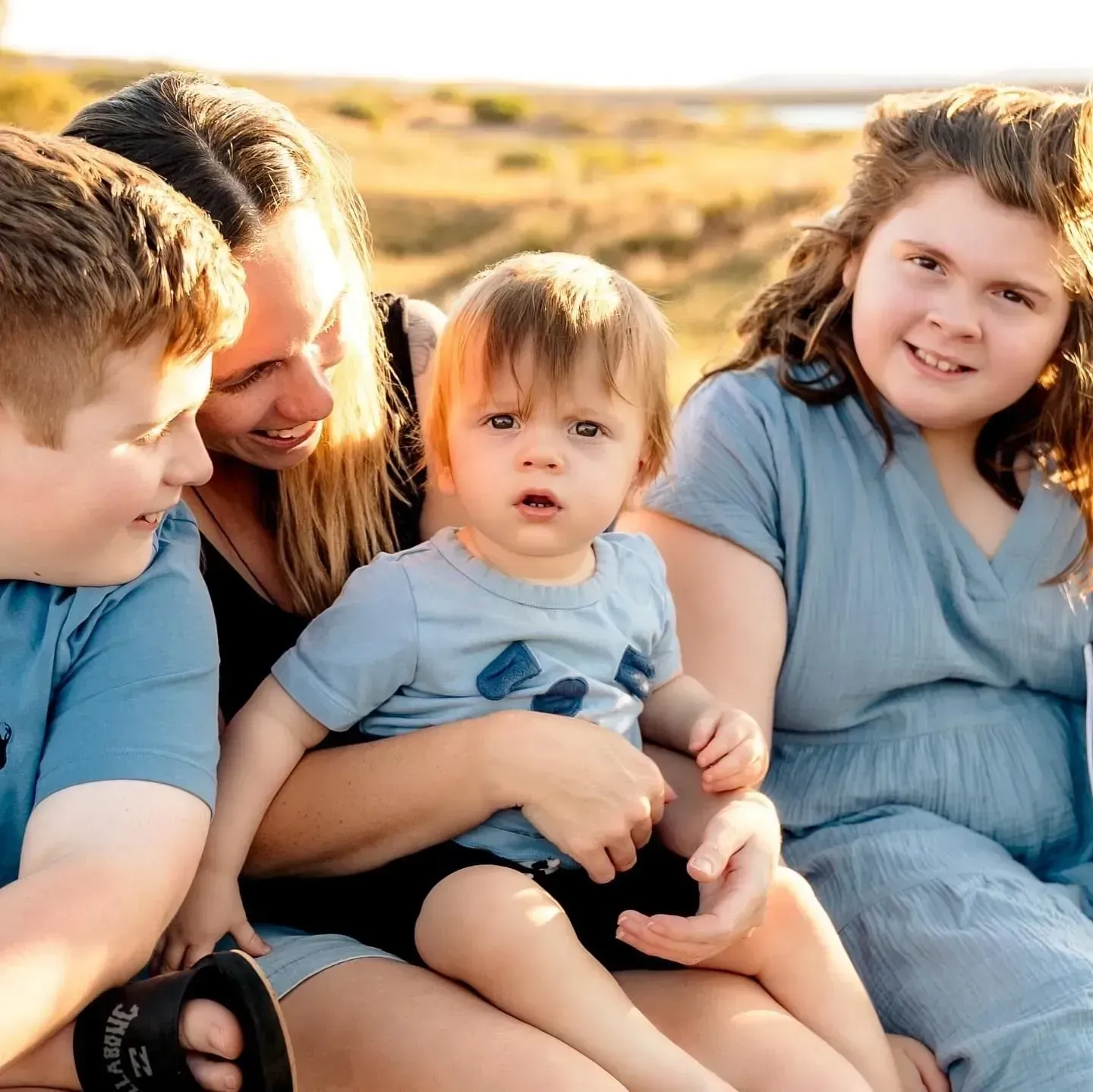 Family photo with Inklings Caregiver, Carol Hegan
